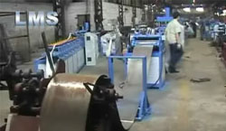 SCAFFOLD WALKBOARD WITH ON-LINE HOLE-PUNCHING ROLL FORMI